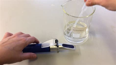 how to use a refractometer saltwater|measuring salinity with a refractometer.